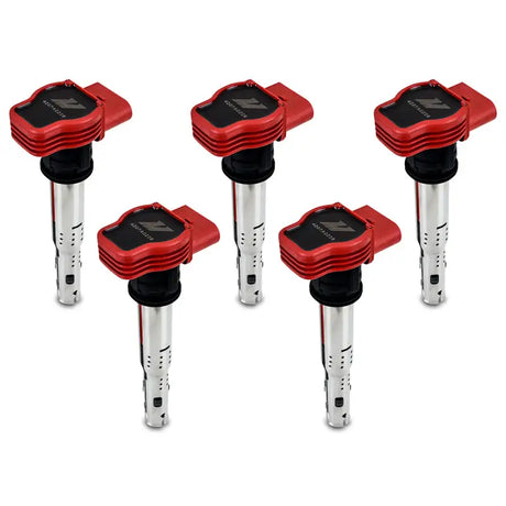 Five red and silver ignition coils from Mishimoto VW/Audi ignition coil set for five cylinders