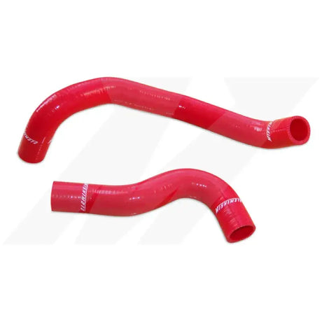 Two red silicone hoses from Mishimoto 07-09 Nissan 350Z silicone hose kit