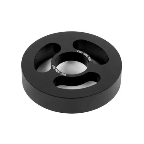 Black circular metal spacer for Mishimoto 08-14 Subaru WRX oil cooler kit