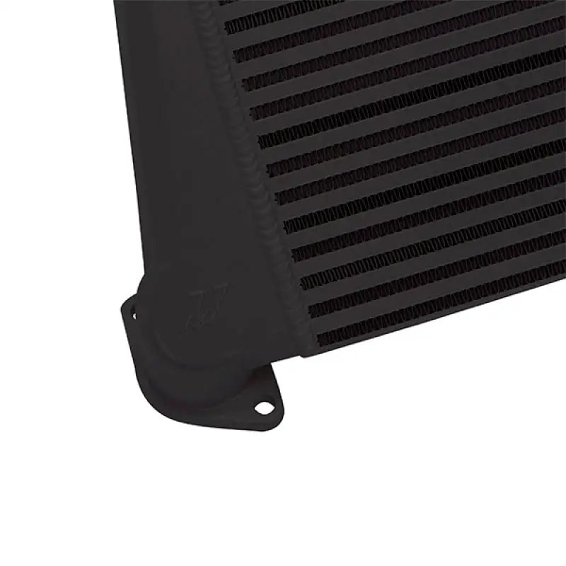 Black intercooler with mounting flange from Mishimoto Subaru WRX top-mount intercooler kit