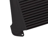 Black intercooler with mounting flange from Mishimoto Subaru WRX top-mount intercooler kit