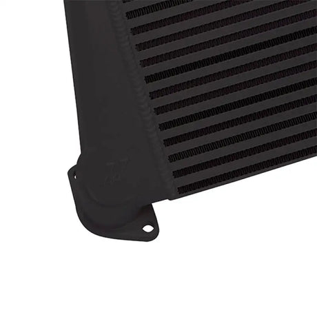 Black intercooler with mounting flange from Mishimoto Subaru WRX top-mount intercooler kit