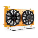 Dual electric fan assembly in Mishimoto Subaru WRX STI aluminum fan shroud gold