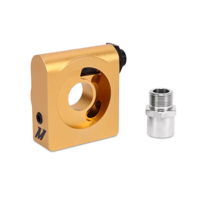 Gold-colored oil filter adapter with silver fitting for Mishimoto Ford Mustang oil cooler kit