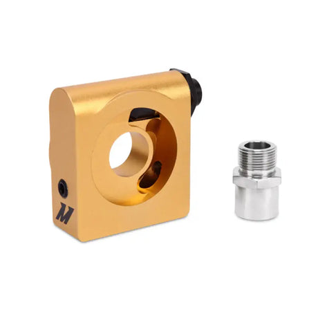 Gold-colored oil filter adapter with silver threaded fitting for Mishimoto oil cooler kit