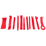 Mishimoto 11-piece trim removal tool set in red, constructed from durable impact-resistant nylon, designed for safe removal of vehicle interior and exterior trim panels, includes cloth pouch for organization and transport.