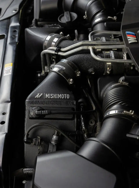 Black Mishimoto engine component from BMW F10 M5 intercooler kit for F10 M5 upgrade