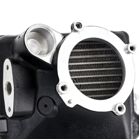 Black metal engine component with silver accents from Mishimoto BMW F10 M5 intercooler kit