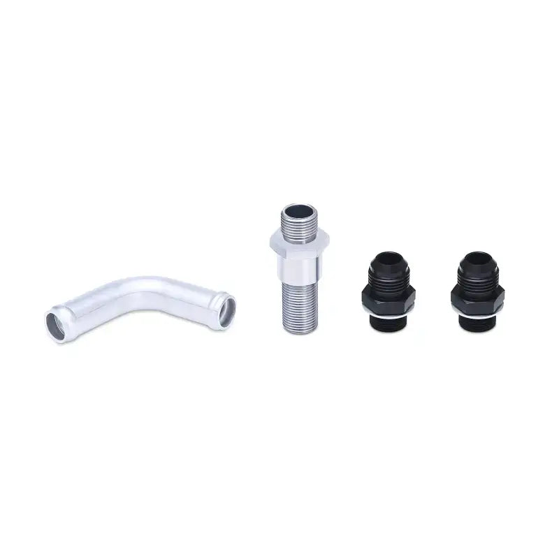 Automotive plumbing fittings for Mishimoto Ford Fiesta ST oil cooler kit in silver