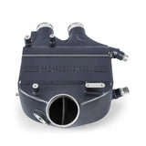 Gray metal intercooler from Mishimoto F8X M3 M4 power pack for upgraded intercooler power