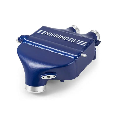 Blue Mishimoto intercooler in the Mishimoto 15-20 BMW F8X M3/M4 power pack for better intercooler power