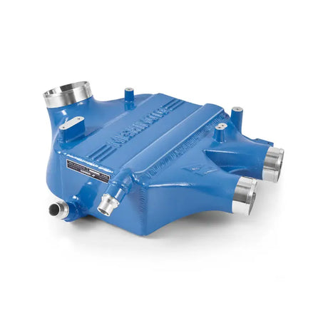 Blue aluminum intercooler with silver fittings from Mishimoto F8X M3/M4 power pack