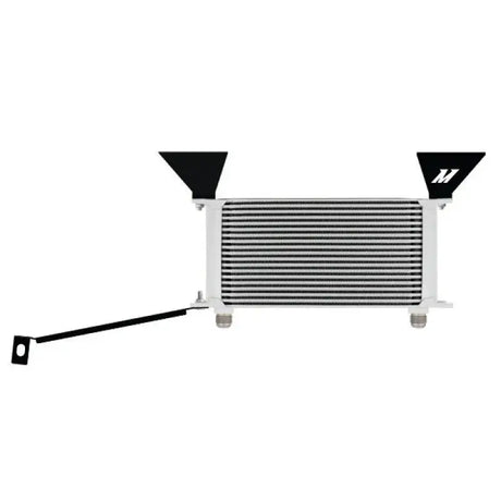 White and silver intercooler with black brackets from Mishimoto oil cooler kit for Ford Mustang