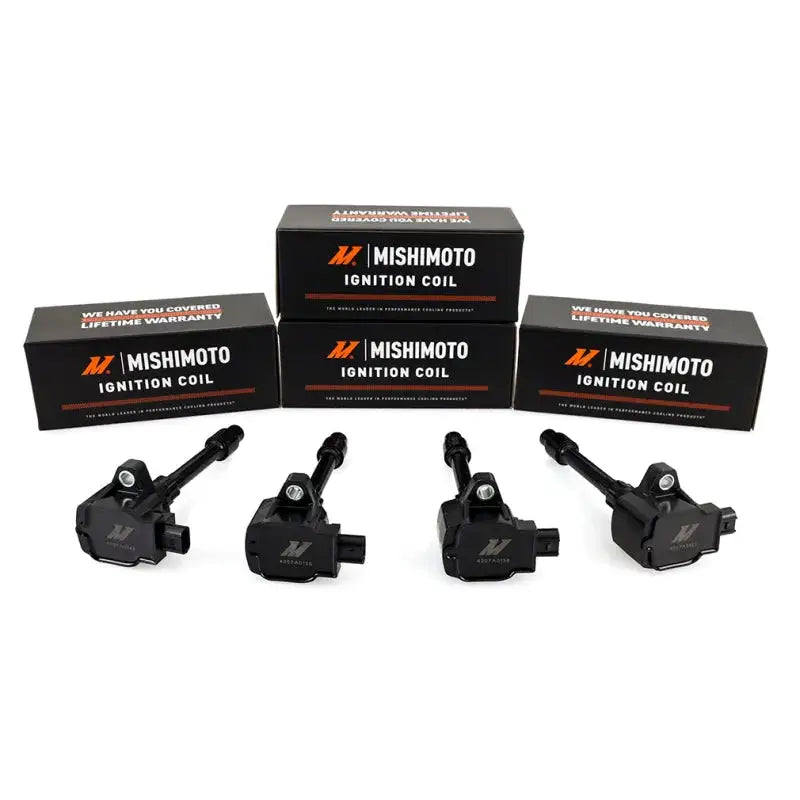 Four black Honda Civic ignition coils with boxes for Mishimoto 16-21 single ignition coil