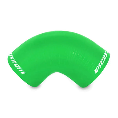 Green silicone elbow hose showing Mishimoto 2.5in 90-degree coupler for universal fitment