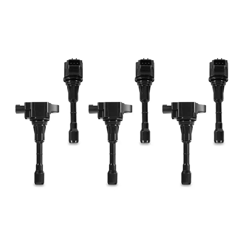 Six black ignition coils from Mishimoto Nissan 370Z ignition coil set of 6