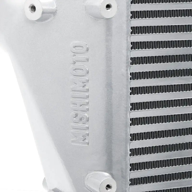 Silver Mishimoto intercooler with horizontal fins for 2013+ Dodge 6.7L Cummins engines