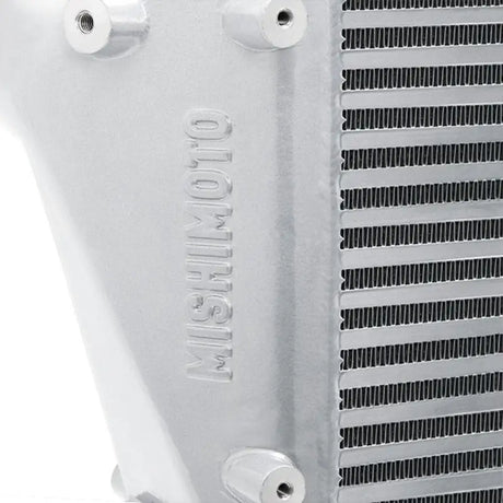 Silver Mishimoto intercooler with horizontal fins for 2013+ Dodge 6.7L Cummins engines