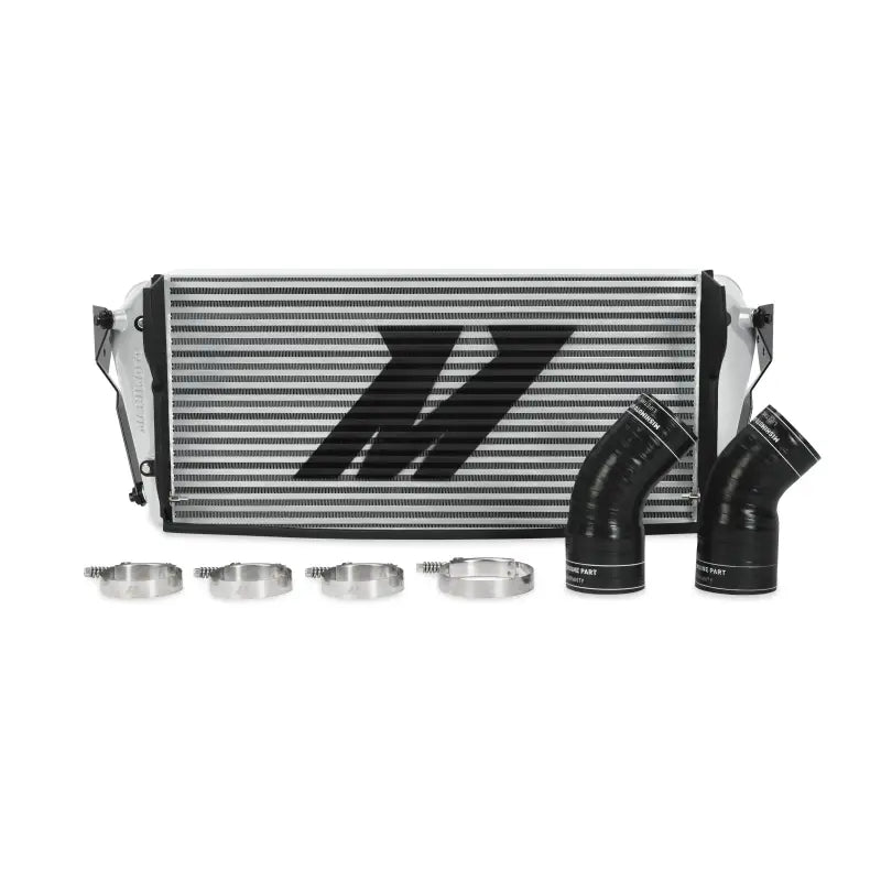 Silver Mishimoto intercooler with black hoses and clamps for Cummins intercooler applications