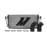 Silver Mishimoto intercooler with black hoses and clamps for Cummins intercooler applications