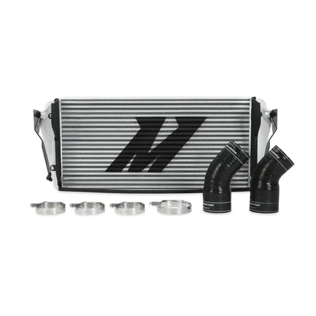 Silver Mishimoto intercooler with black hoses and clamps for Cummins intercooler applications