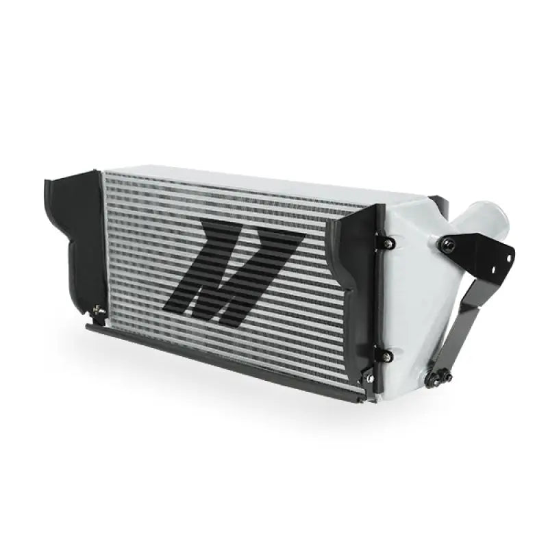 Silver and white Mishimoto intercooler for Dodge 6.7L Cummins with black brackets
