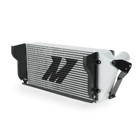 Silver and white Mishimoto intercooler for Dodge 6.7L Cummins with black brackets