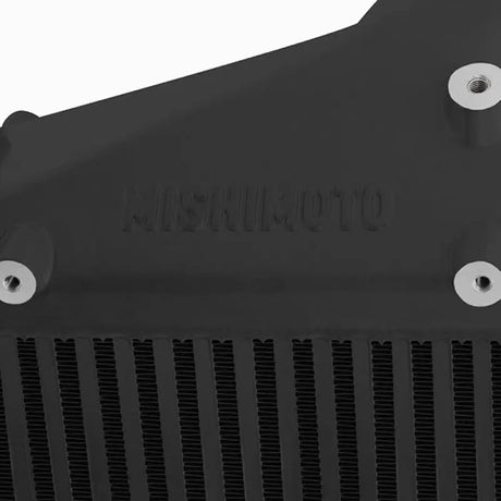 Black intercooler with mounting points for Mishimoto intercooler kit on Dodge Cummins engine