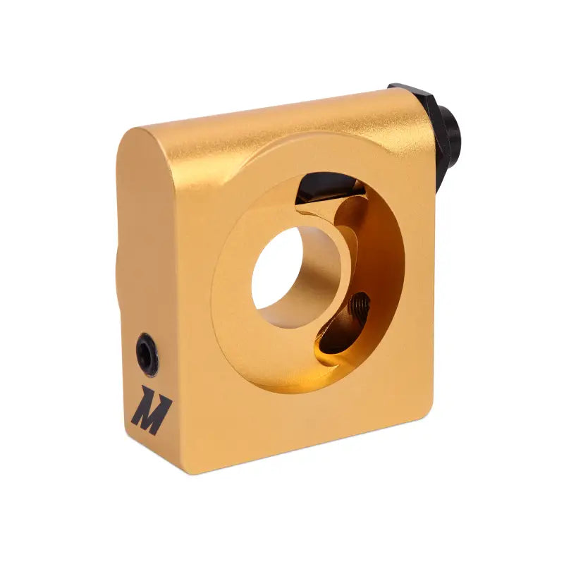 Gold-colored metal adapter with central opening for Mishimoto Camaro oil cooler kit