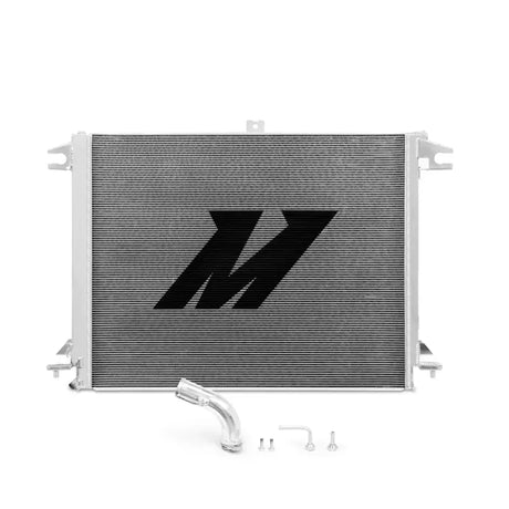 Silver Nissan Titan aluminum radiator with accessories for better cooling efficiency