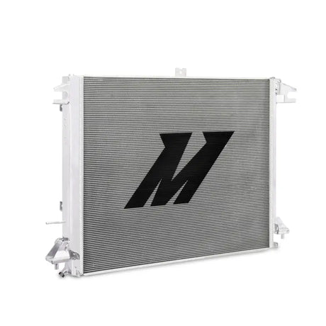 Silver aluminum radiator with black logo for Nissan Titan enhanced cooling efficiency
