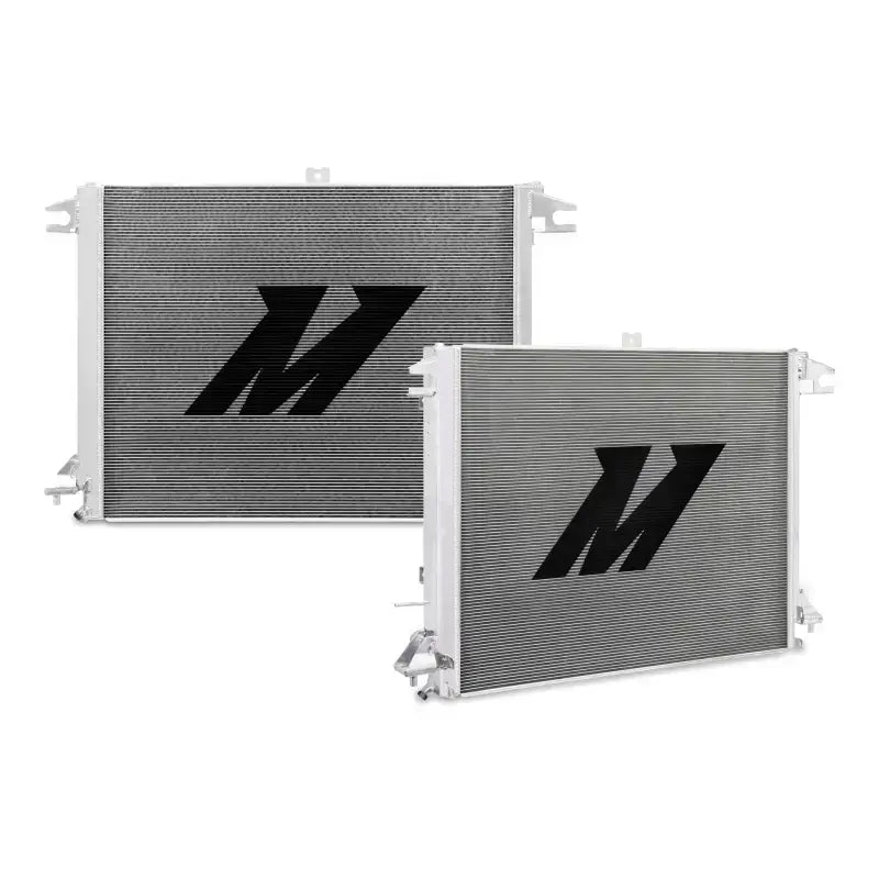 Two silver aluminum radiators with black logos for Nissan Titan cooling efficiency