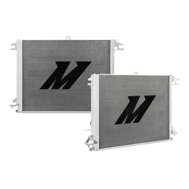 Two silver aluminum radiators with black logos for Nissan Titan cooling efficiency