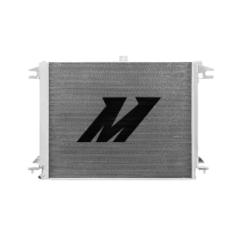 Silver Nissan Titan aluminum radiator with black logo boosting cooling efficiency