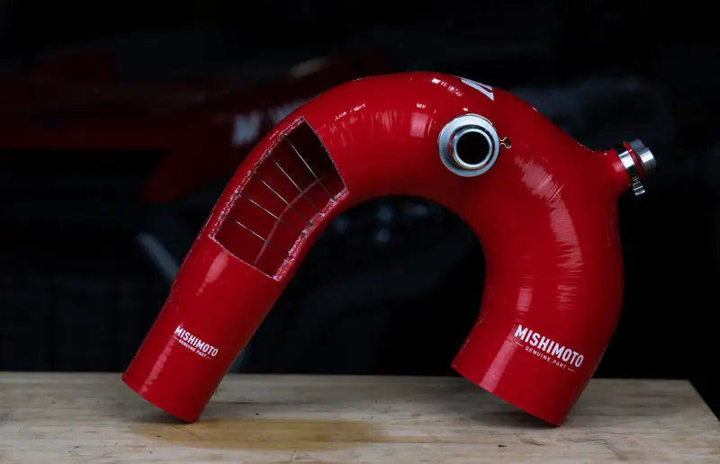 Red silicone intake hose with internal wire support for Polaris RZR XP Turbo cleaning