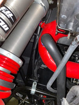 Red and black engine hoses on Mishimoto silicone intake for Polaris RZR XP Turbo