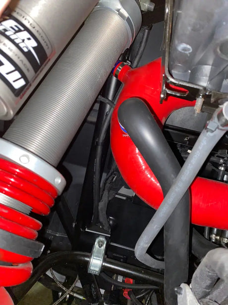 Red and black engine hoses on Mishimoto silicone intake for Polaris RZR XP Turbo