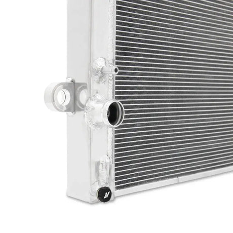 Mishimoto 2016+ Toyota Tacoma 2.7L/3.5L Performance Aluminum Radiator close-up showing high-quality aluminum construction and precision-engineered design.