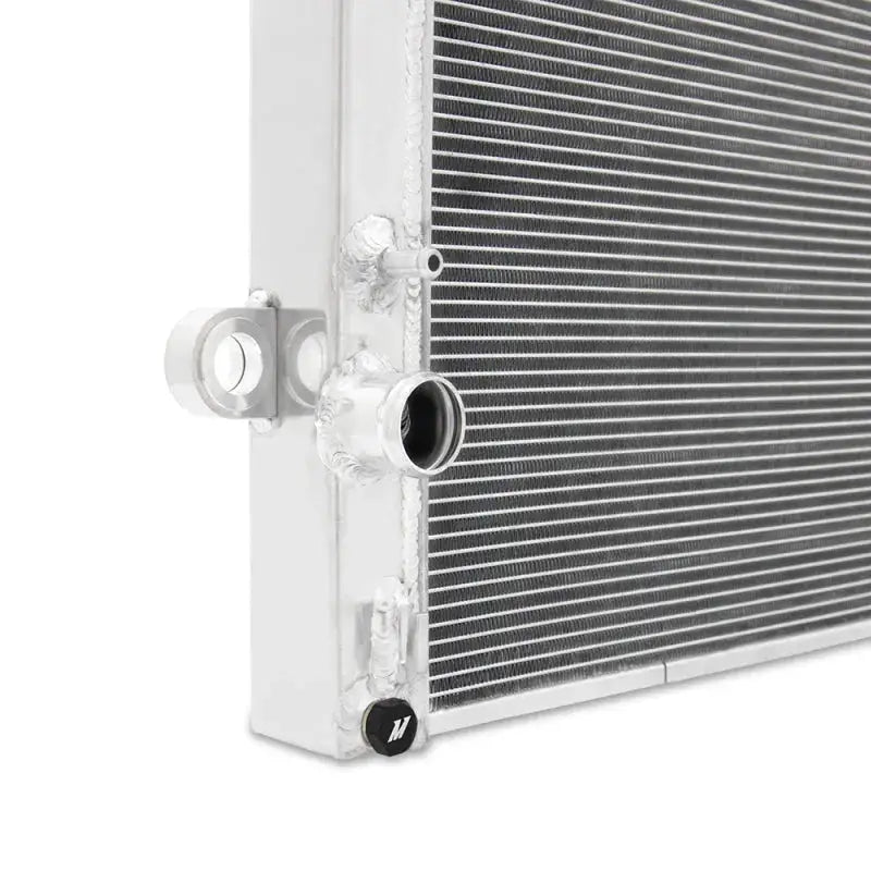 Mishimoto 2016+ Toyota Tacoma 2.7L/3.5L Performance Aluminum Radiator close-up showing high-quality aluminum construction and precision-engineered design.