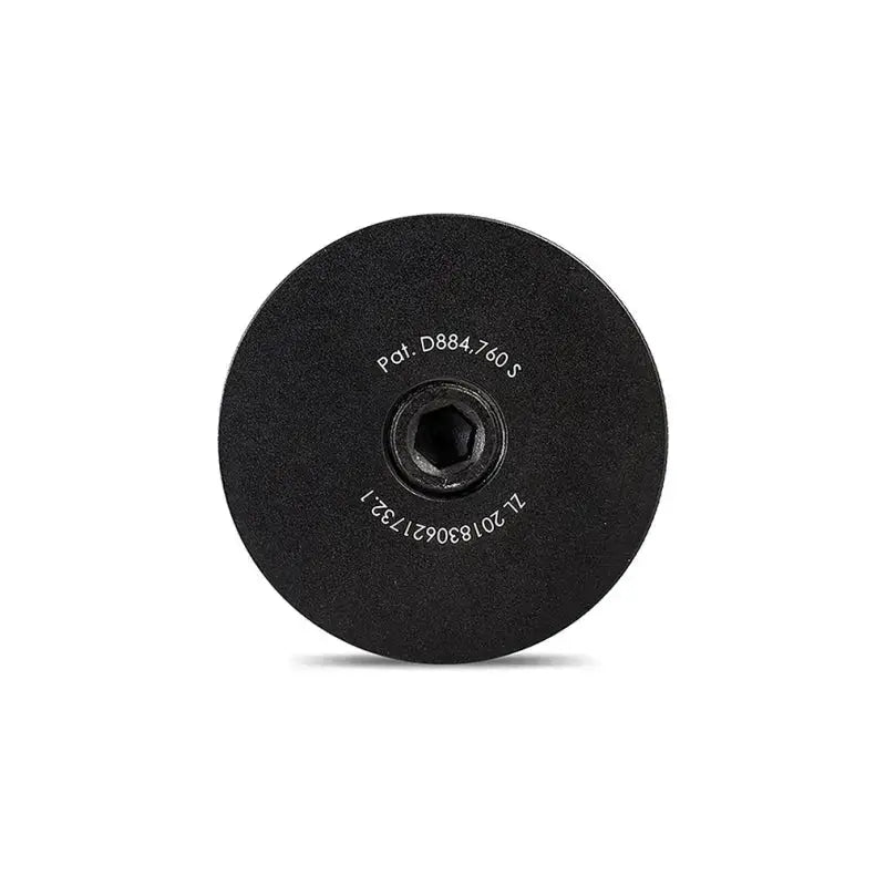 Black circular metal cap with hex recess for Subaru BRZ Toyota GR86 baffled oil catch