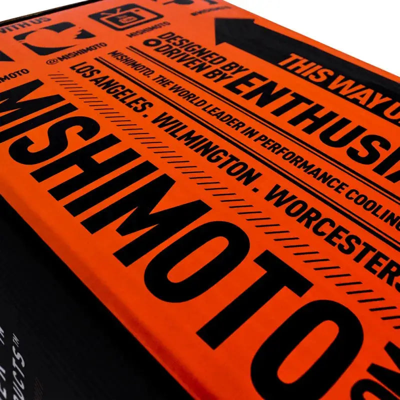 Orange Mishimoto box for Subaru WRX thermostatic oil cooler kit in silver