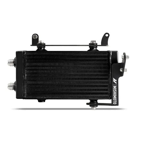 Black oil cooler with mounting brackets from Mishimoto Toyota GR Corolla oil cooler kit