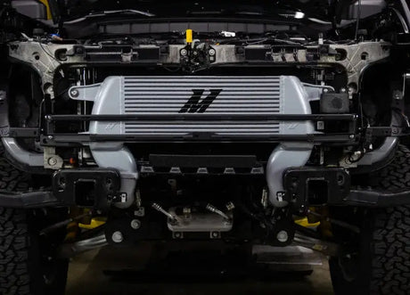 Gray intercooler with black logo from Mishimoto 21+ Bronco high mount int kit