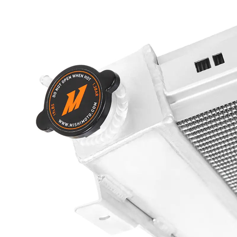 Photo of Mishimoto performance aluminum radiator with black cap for Pontiac Firebird