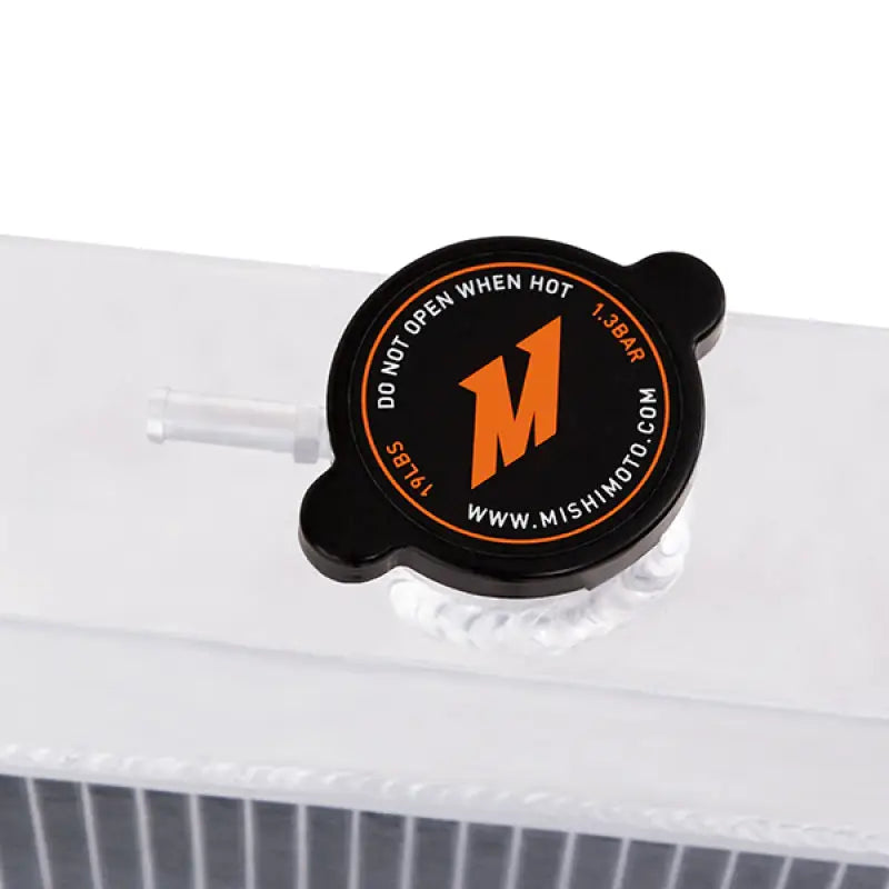 Black radiator cap on Mishimoto aluminum radiator for Plymouth Barracuda small block engine
