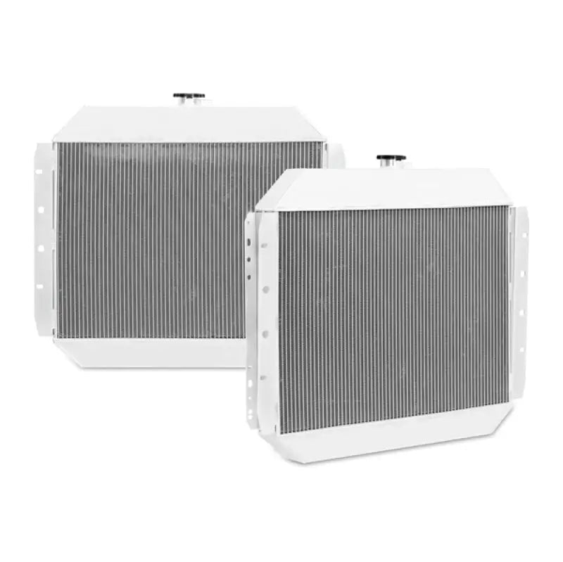 Two white aluminum radiators from Mishimoto Ford F-Series X-Line Aluminum Radiator