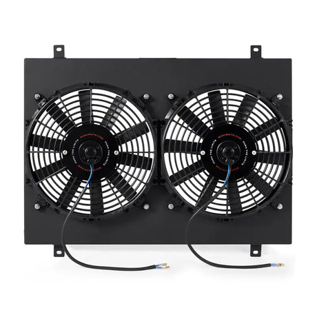 Dual electric radiator fan assembly on Mishimoto Ford Mustang aluminum fan shroud black