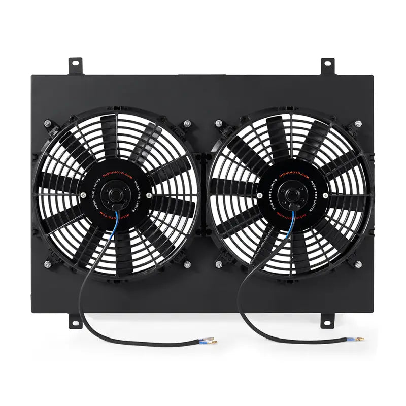 Dual electric radiator fan assembly on Mishimoto Ford Mustang aluminum fan shroud black