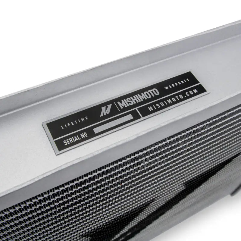 Mishimoto aluminum radiator for Holden Commodore with warranty label, boosting cooling efficiency