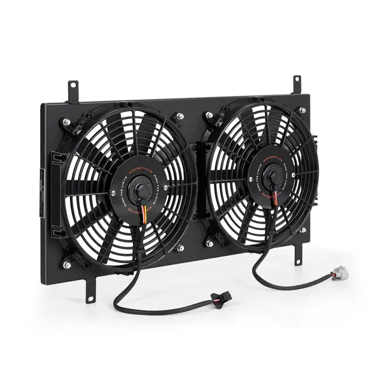Dual electric radiator fan assembly in Mishimoto aluminum fan shroud kit for Mazda Miata